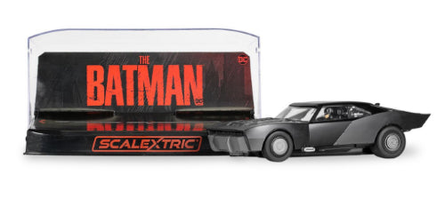 Scalextric Batmobile from 'The Batman' 2022, featuring sleek design, authentic black livery, and high-speed racing action.