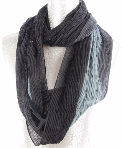 Elegant green pleat infinity scarf, 90cm x 180cm, perfect for stylish layering in any season.