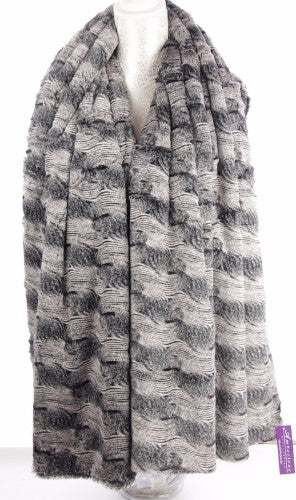 Elegant Raked Sands Shawl in soft textures, 72cm wide by 190cm long, perfect for layering and versatile styling.