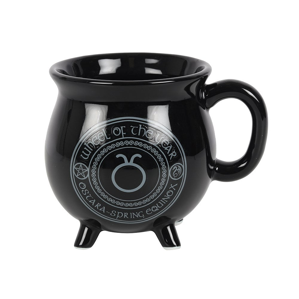 Ostara Colour Changing Cauldron Mug featuring an illuminating dragon design and sabbat symbols, perfect for any hot beverage.