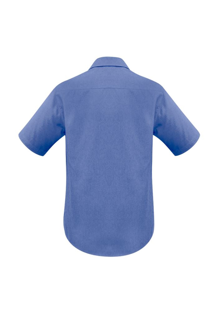 Men's Mid Blue Oasis Short Sleeve Shirt with standard collar, jet pocket, curved hem, made from breathable UPF fabric.