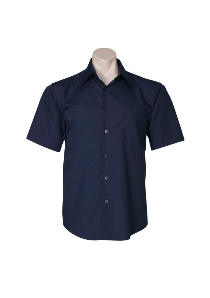 Men's navy short sleeve shirt in size 5XL by Biz Collection, featuring a tapered fit, curved hem, and left chest pocket.
