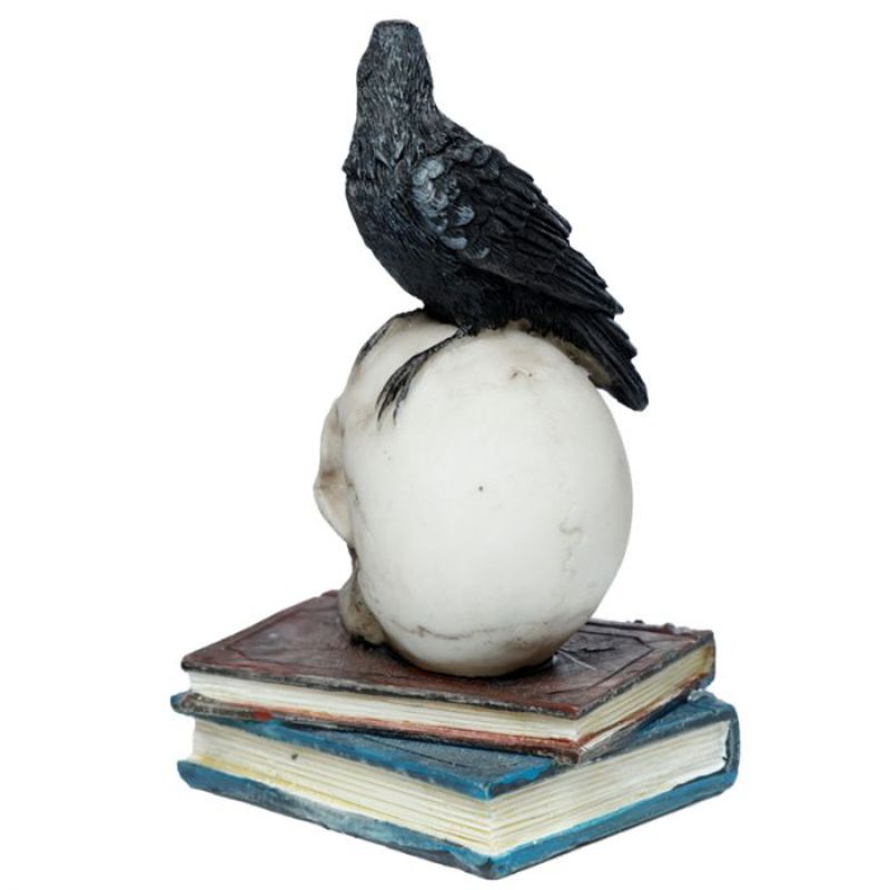 Gothic crow standing on a skull and books ornament, 10cm tall, crafted from durable resin for unique home decor.