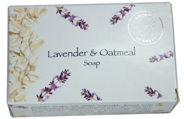 Herbal Lavender & Oatmeal Soap bar, crafted for sensitive skin, offers soothing exfoliation and a calming lavender fragrance.