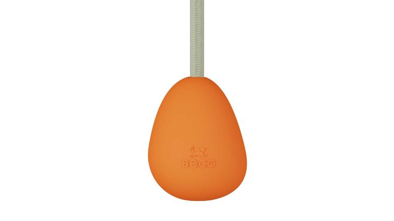 Bright orange Beco Slinger Pebble dog toy made from eco-friendly rubber and a tough recycled rope for fetch and tug-of-war.