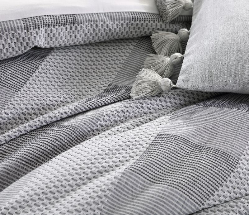 Queen duvet cover set in Subi Grey, featuring 100% cotton jacquard; elegant tonal greys for a chic bedroom aesthetic.