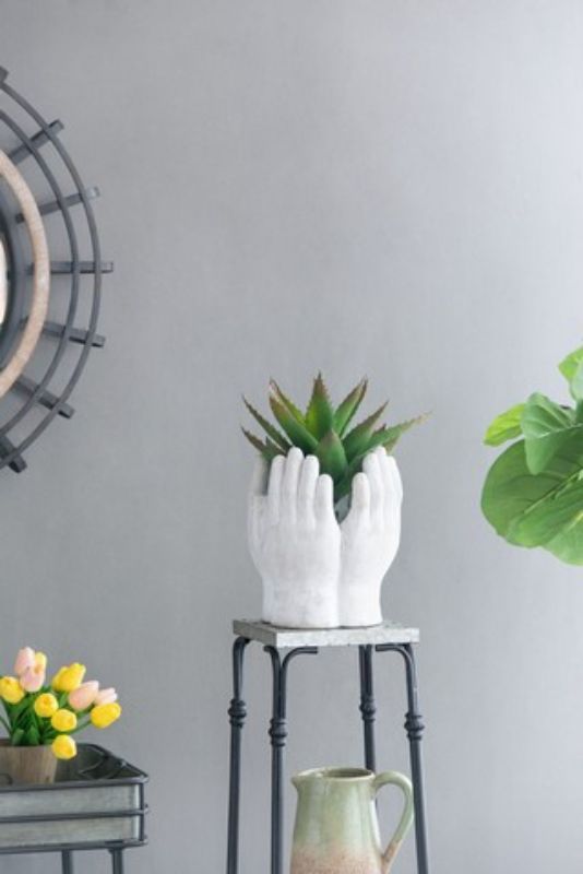 Elegant 42cm hand-shaped planter crafted from concrete, perfect for plants or storage in any indoor or outdoor space.