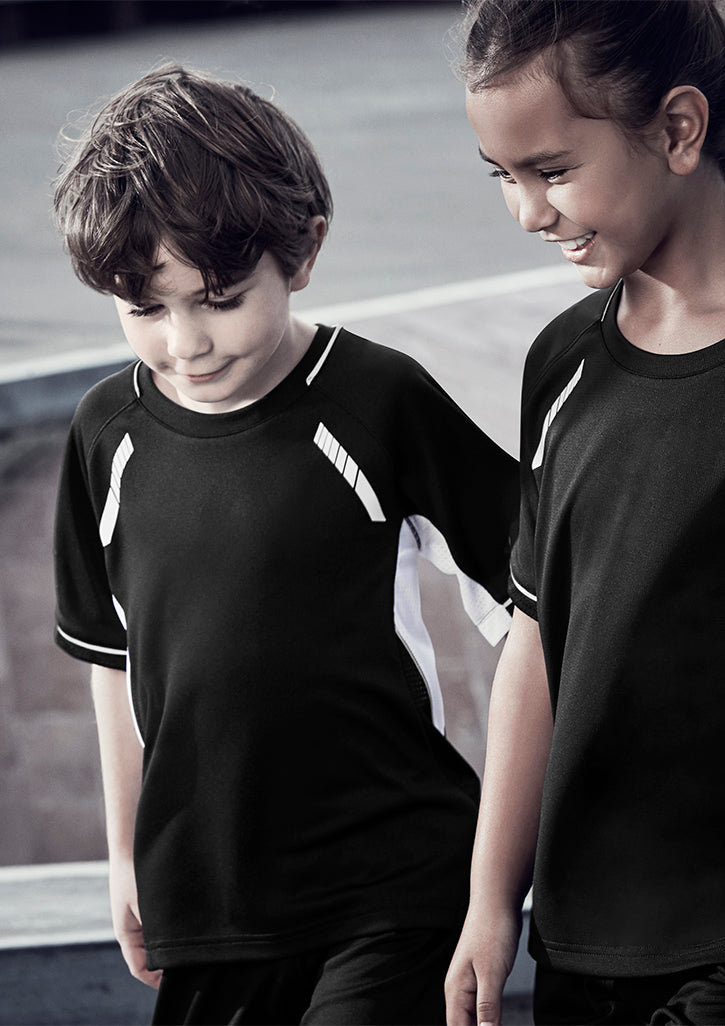 Kids Renegade Tee in black, gold, and silver features breathable fabric, reflective trims, and raglan sleeves for active play.