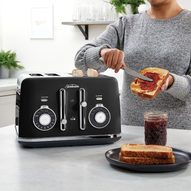 Sleek black Sunbeam Alinea™ 4 Slice Toaster with 6 bread types, 9 browning settings, and convenient features for perfect toast.