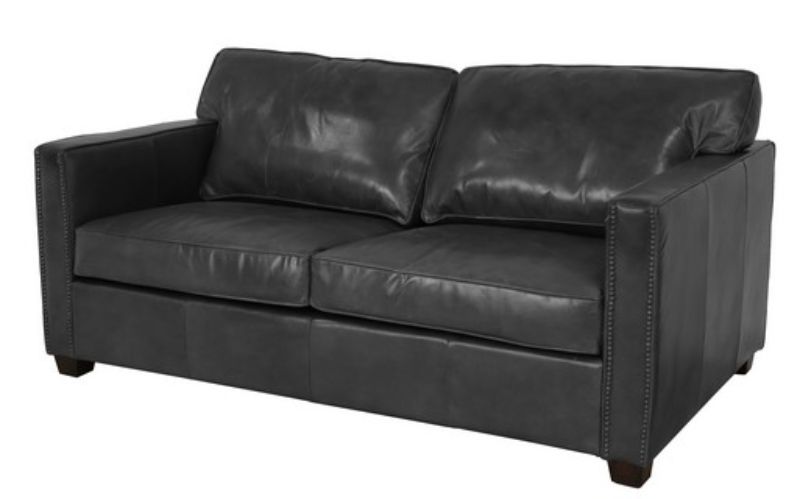 Stylish black two-seater sofa with modern design and durable comfort, perfect for any living space.