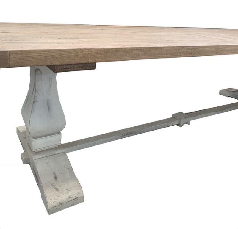 Reclaimed elm dining table with white double pedestal base, seats up to 8, showcasing rustic charm and modern elegance.