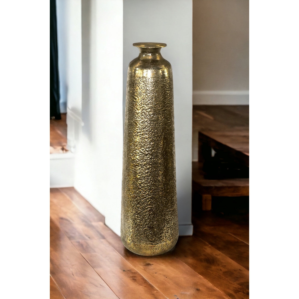 Tall antique gold vase made of aluminum, adding sophisticated elegance and vintage charm to any decor, perfect as a centerpiece.