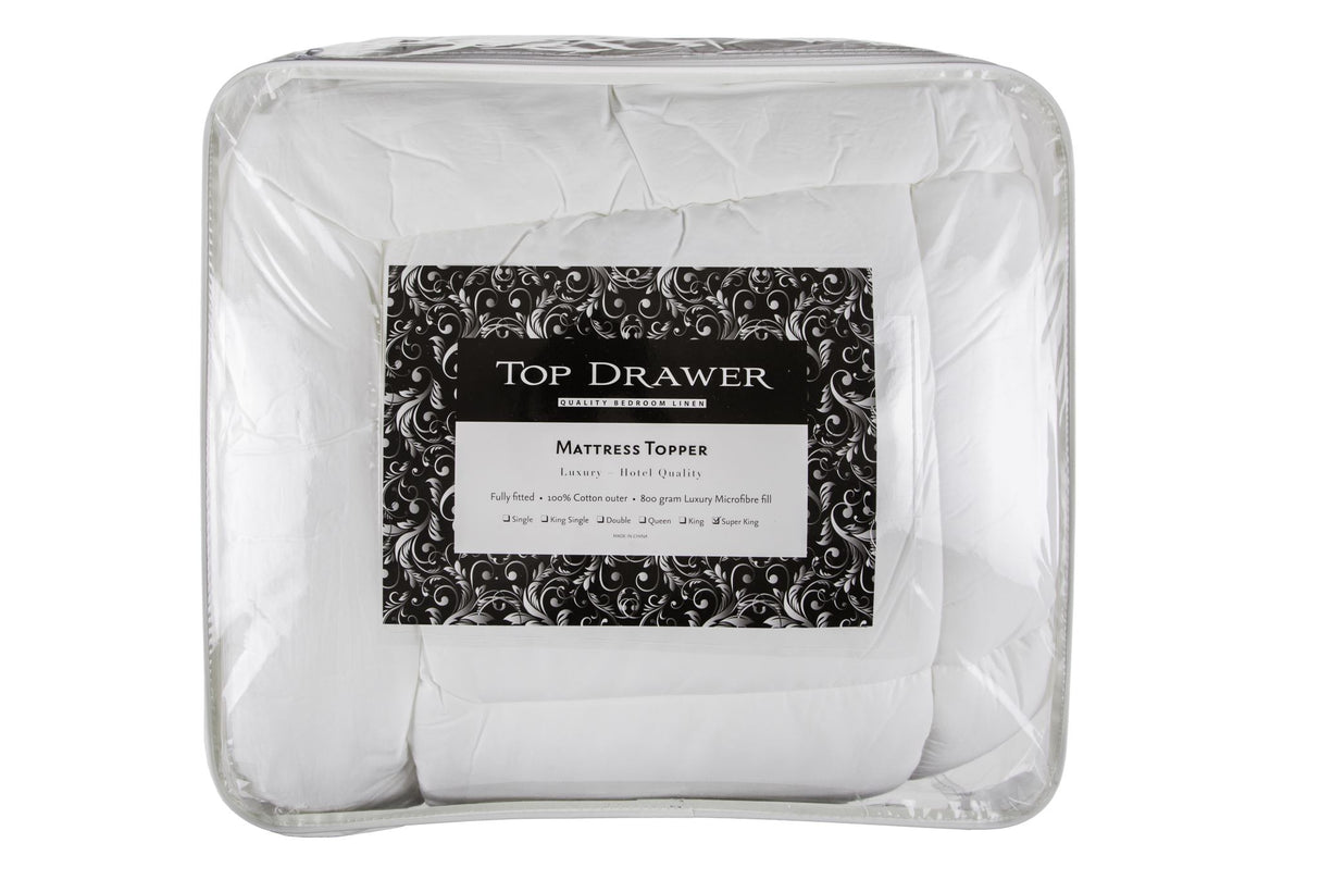 Soft, hypoallergenic microfibre mattress topper with quilted layer and 40cm fitted skirt for Super King beds.