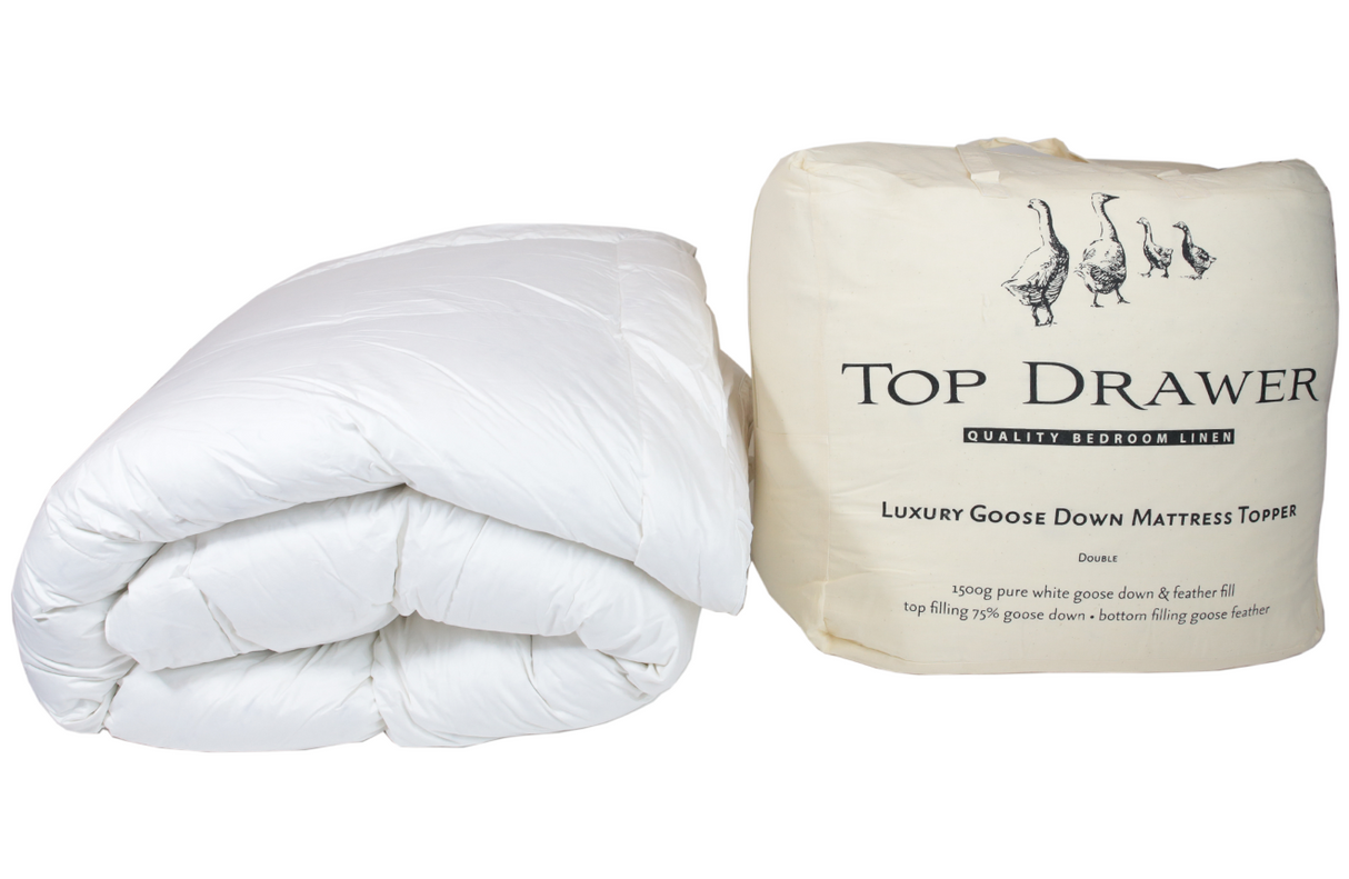 Luxurious king mattress topper with 75% goose down and 25% feather fill for exceptional softness and support.