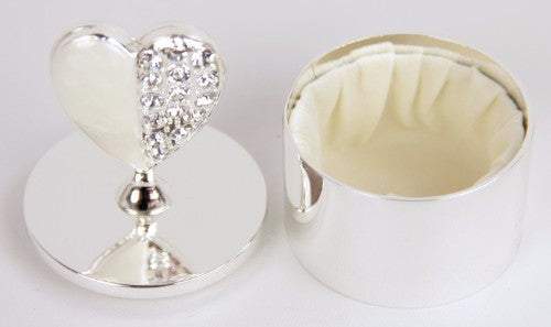 Elegant crystal heart trinket box on silver base, perfect for jewelry storage and decorative display.