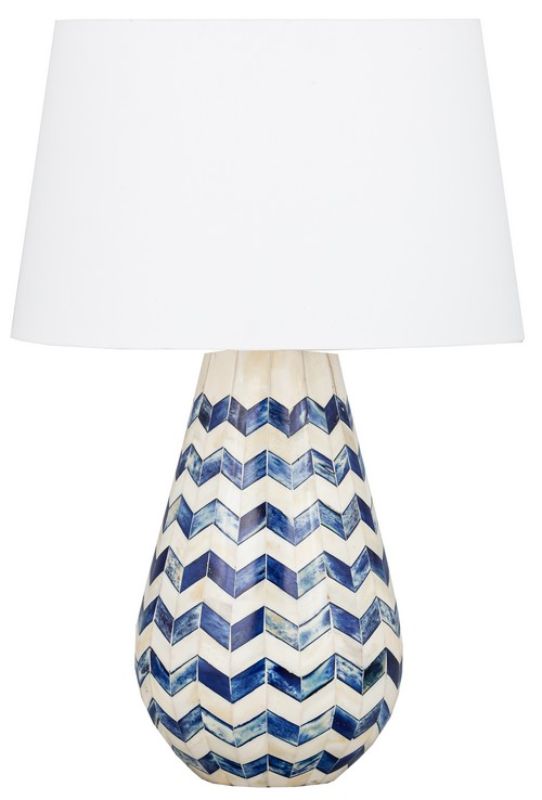 Elegant table lamp with a mosaic blue and white base and a soft white linen shade, perfect for stylish home decor.