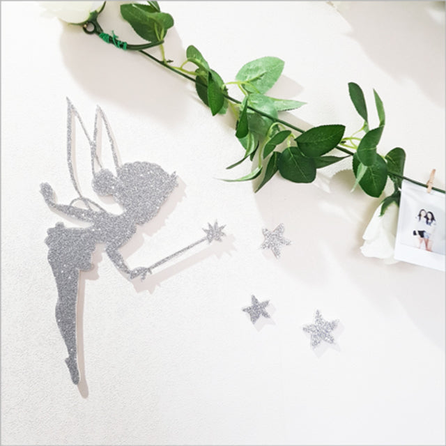 Glittery Tinkerbell wall art with stars, ideal for nursery decor, measuring 18cm x 28.5cm, adds magic to any room.