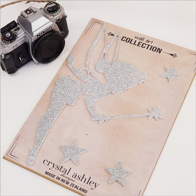 Delightful Tinkerbell wall art with shimmering stars, perfect for adding magic to a child's nursery or bedroom decor.