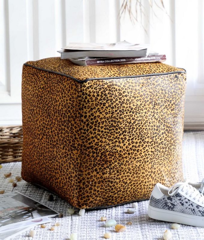 Leather square ottoman in leopard print, 45cm, made from durable cowhide; stylish and functional seating or accent piece.