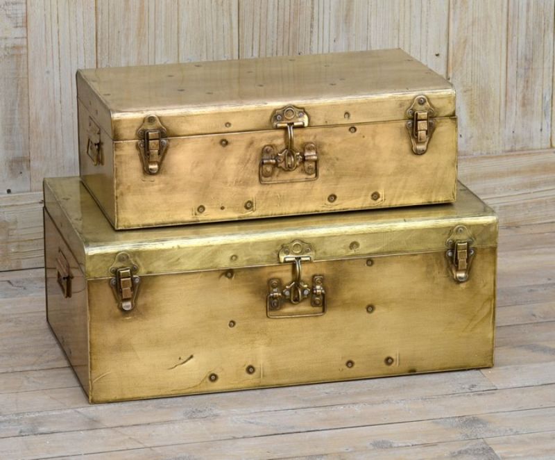 Set of 2 stylish copper trunks for storage, featuring a slightly worn finish that enhances contemporary decor.