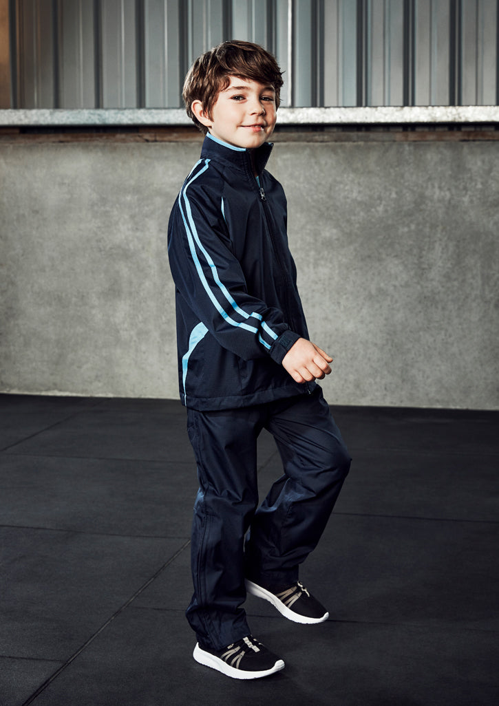 Kids Navy Flash Track Pant in Size 6, featuring elastic waist, zip pockets, and bottom leg zippers for active comfort.