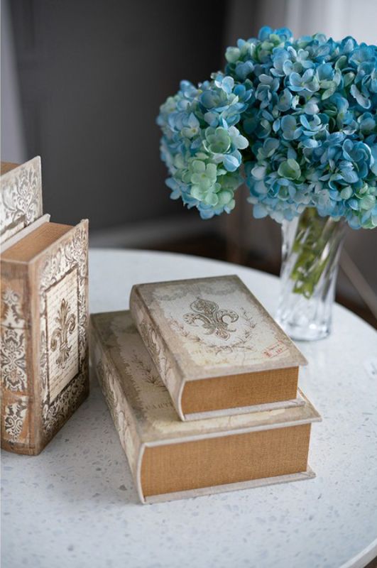 Set of 4 decorative book-shaped storage boxes in linen and MDF, perfect for organizing trinkets and photos stylishly.