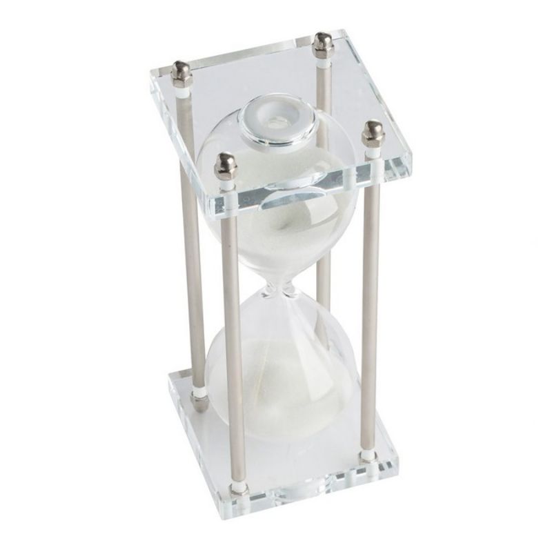 Elegant silver and white hourglass with sleek curves on a clear acrylic and gold stand, perfect for modern decor.