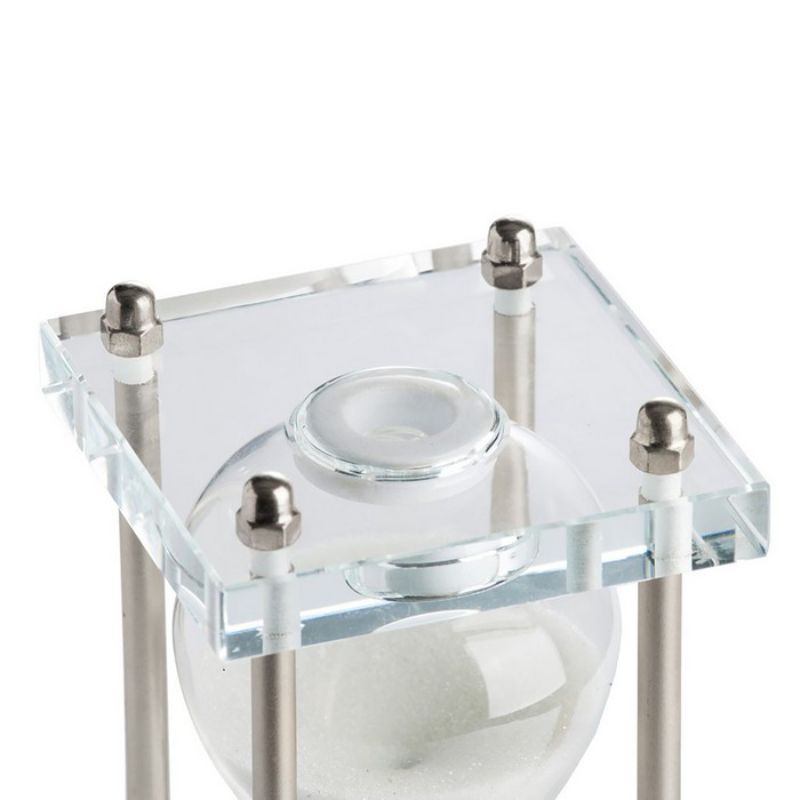 Modern silver and white hourglass with sleek curves on an acrylic stand, ideal for elegant home or office decor.