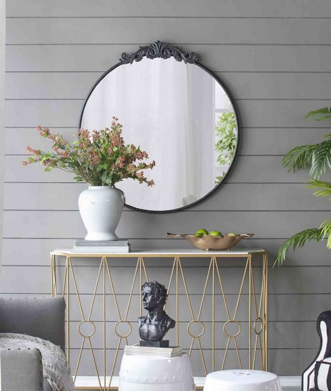 Round black metal mirror (97.8cm), stylish and modern, perfect for enhancing decor and creating spacious illusions.