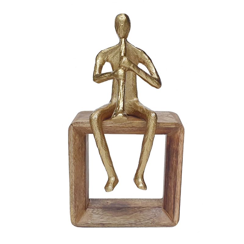 Gold abstract clarinet player sculpture on mango wood base, perfect for music lovers and modern decor accents.