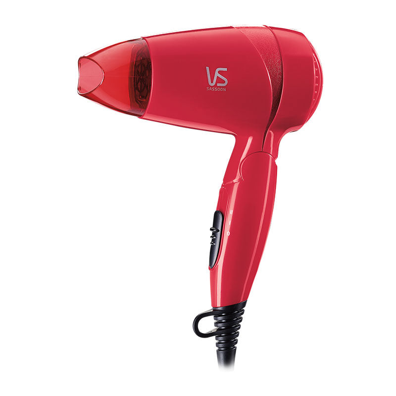Compact Vidal Sassoon Pocket Rocket miniPRO Travel Hair Dryer, 1200W, lightweight, with folding handle and concentrator for sleek styling.