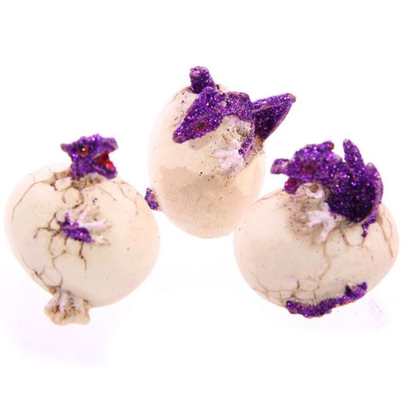 A colorful collection of 12 baby dragon eggs, each uniquely designed for imaginative play and creative storytelling.