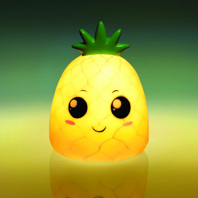 Adorable Smoosho's Pals Pineapple table lamp with warm glow, perfect as a nightlight for kids' rooms and fun decor piece.