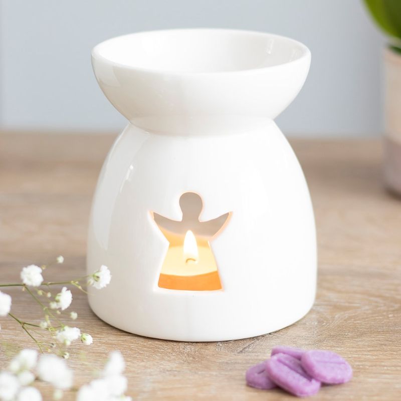 Angel Cut Out Ceramic Oil Burner in crisp white with charming angel cutout, perfect for soothing aromas and stylish decor.