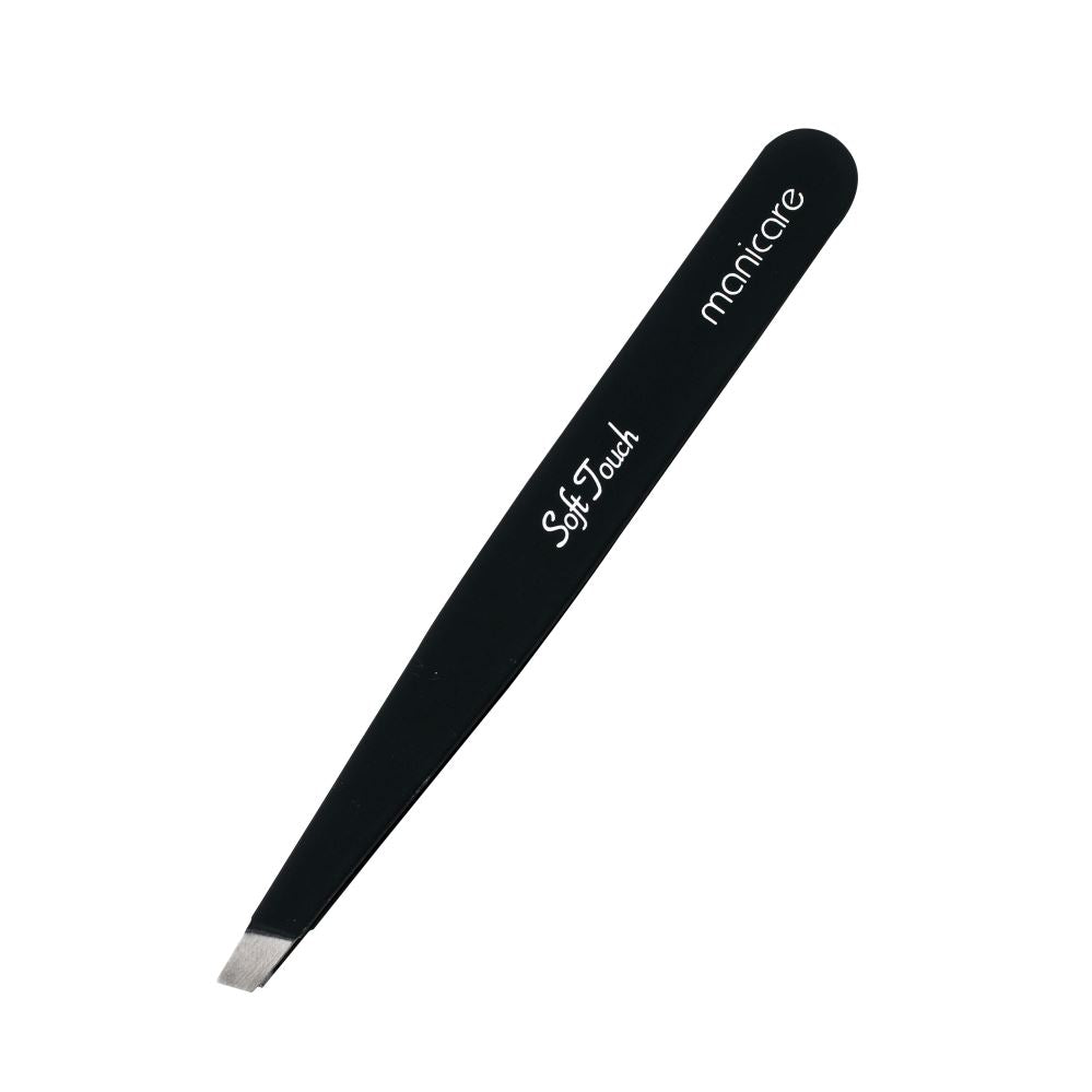 Manicare Soft Touch Slant Tip Tweezers in stainless steel with a soft grip, perfect for precise hair removal and eyebrow shaping.