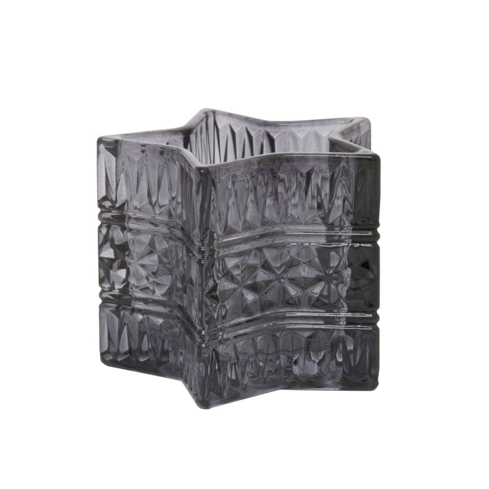 Black star-shaped glass tea light holder, measuring 98x98x80mm, perfect for creating a cozy ambiance.