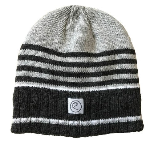Black and grey striped beanie for winter style, offering warmth and comfort for men and women with a snug fit.