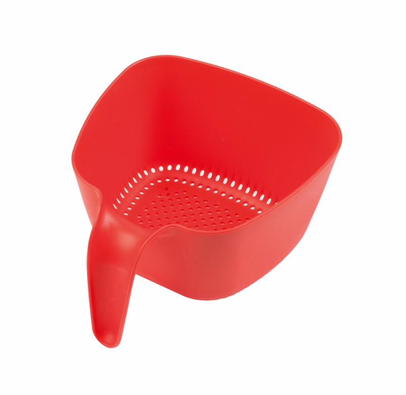Small red colander by ZEAL, compact design for draining and rinsing, with ergonomic handle and easy pour corners.