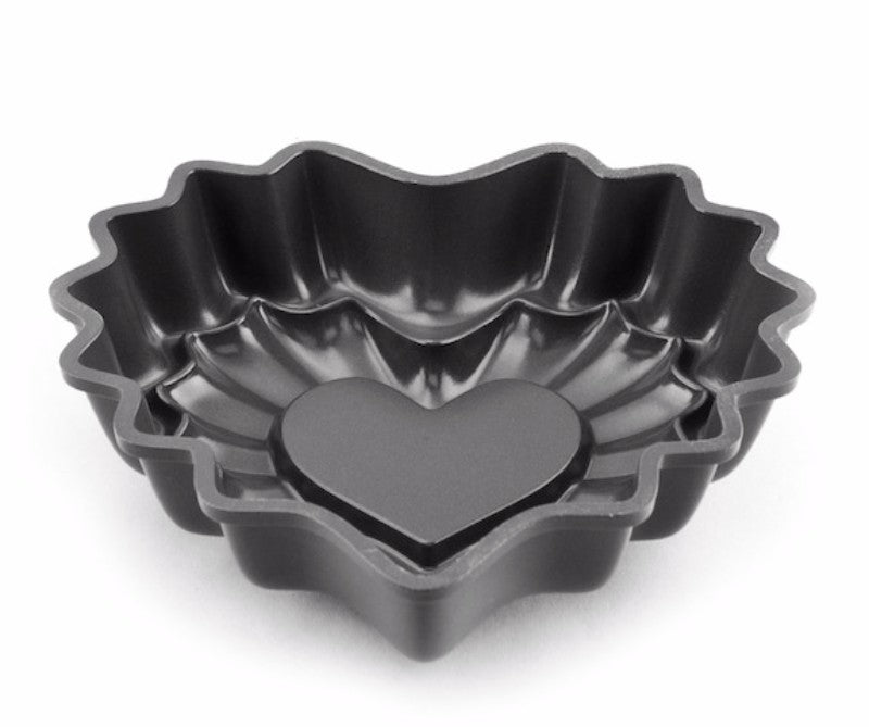Mini Heart Bundt Pan made from heavy aluminum, 3-cup capacity, perfect for heart-shaped cakes and desserts.