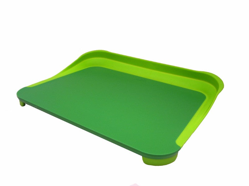 Eco-friendly green cutting board with collapsible rim, non-slip base, and dishwasher safe for easy meal prep and waste reduction.