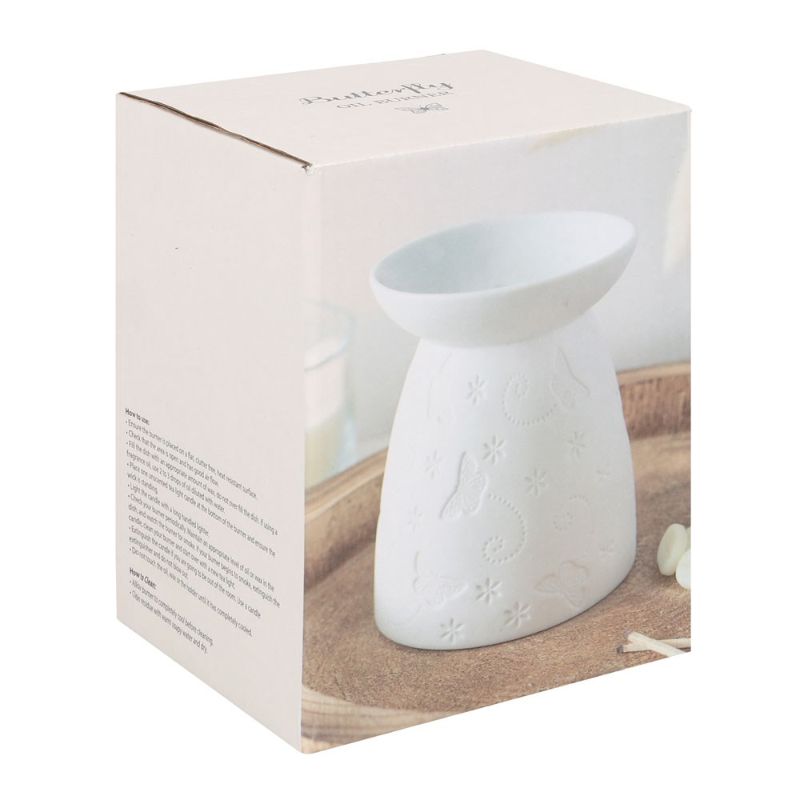 Elegant white ceramic butterfly oil burner, designed for wax melts, featuring delicate butterfly and flower accents.