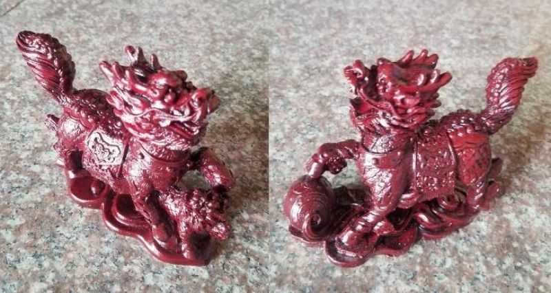 Vibrant 12cm red Feng Shui lion pair, symbolizing strength and protection, perfect for attracting positive energy.