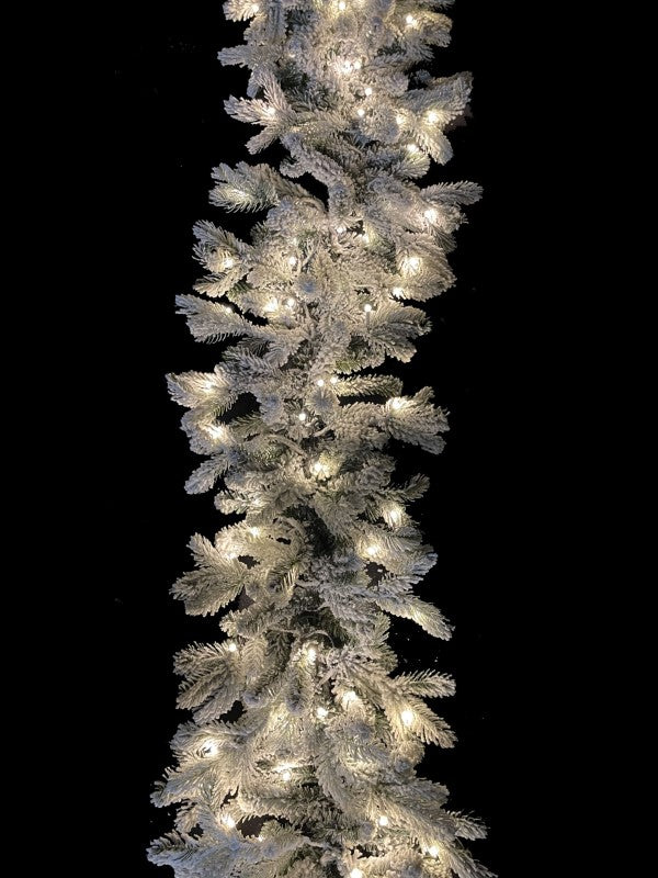 200 cm snowy garland with warm LED lights, featuring 324 tips for a festive and elegant holiday decor.