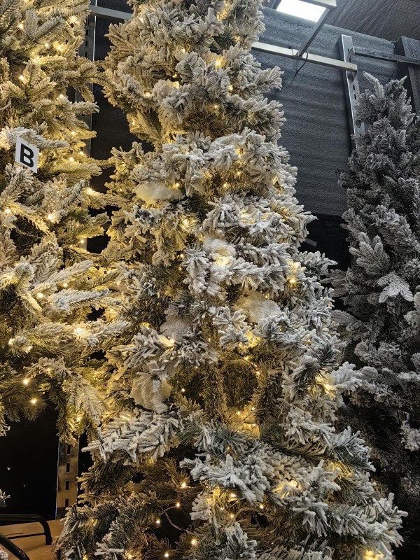 8' Heavy Snow Slim Pine Tree with 600 warm white lights, featuring realistic snowy branches for festive holiday decor.