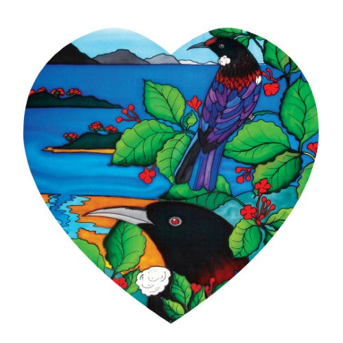 Ceramic heart wall hanging featuring a vibrant Tui design, perfect for enhancing home decor with Kiwiana charm.
