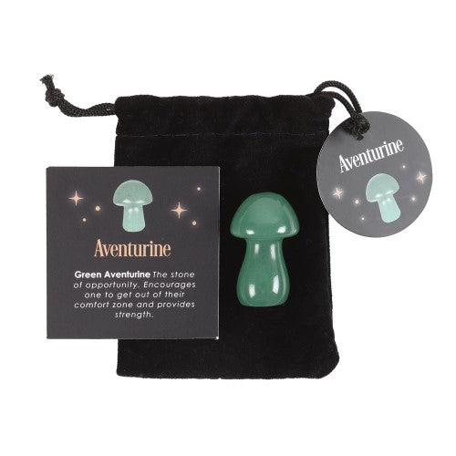 A polished aventurine crystal mushroom, 3.5 cm tall, promoting strength and calm in a mystical home decor piece.