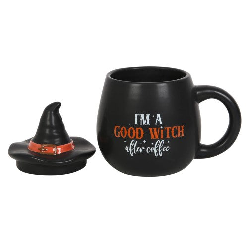 Whimsical coffee mug with witch hat lid, perfect for morning brews and adding magic to your routine.