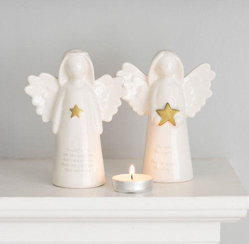 White ceramic angel ornament with a gold star and heartfelt friendship message, perfect for home decor and gifts.