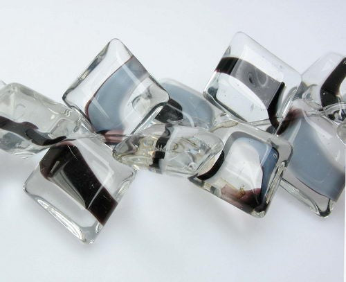 Tooth-shaped glass beads, 16x28mm, pack of 40, ideal for jewelry making, crafts, and DIY projects.