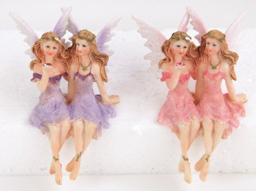 Delightful Double Fairies Ornament featuring a pink and purple fairy entwined, perfect for enchanting home decor.